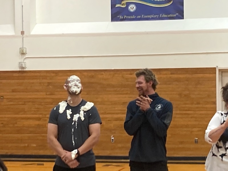 Mr. Russell gets pied. 